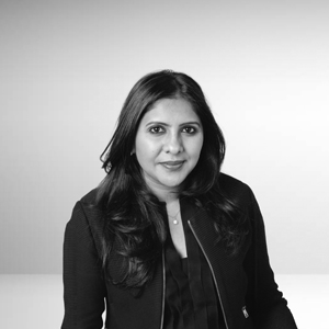 Professional headshot of Dr. Flomny Menon, Senior Lecturer at Regent European University